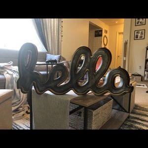 Metal “hello” sign